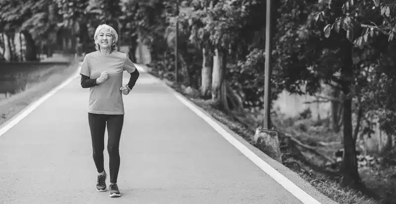 A woman walking on the road.